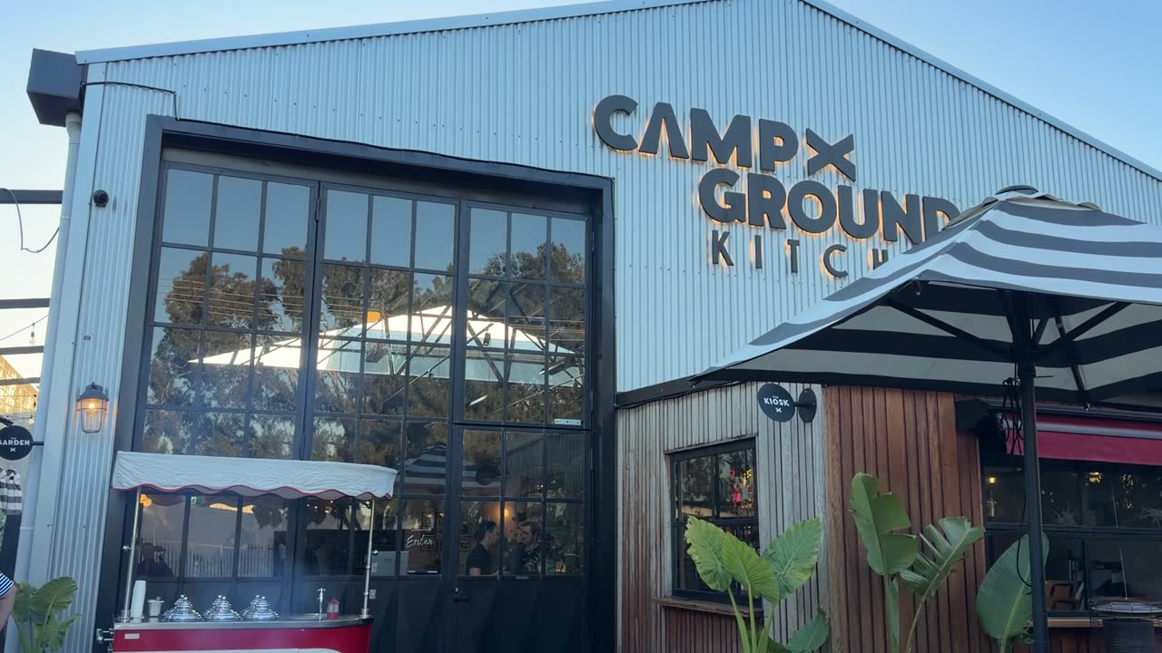Campground Kitchen's corrugated warehouse facade at golden hour